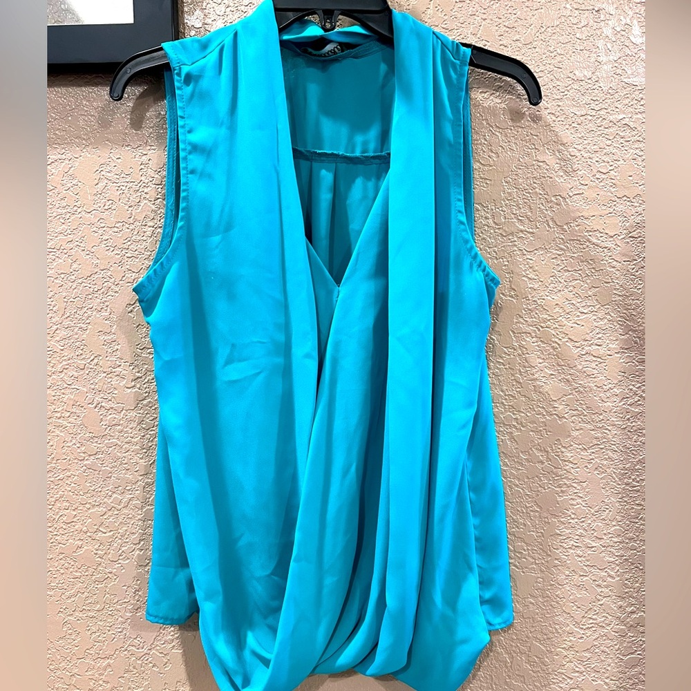 Blue sleeveless drapey top